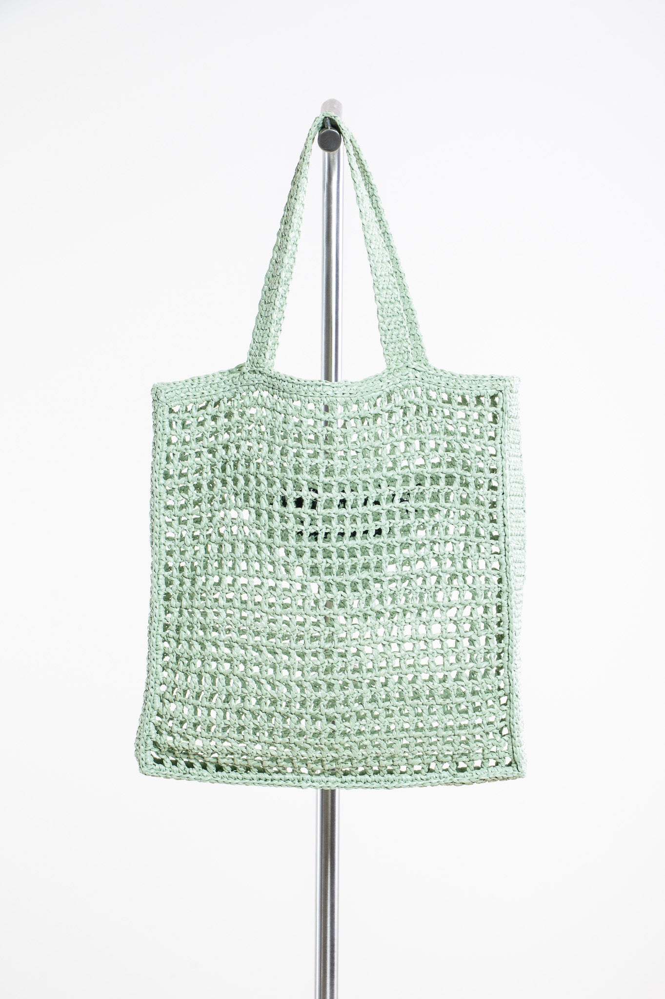 Back view of Prada Crochet Tote Bag in green viscose with crochet design