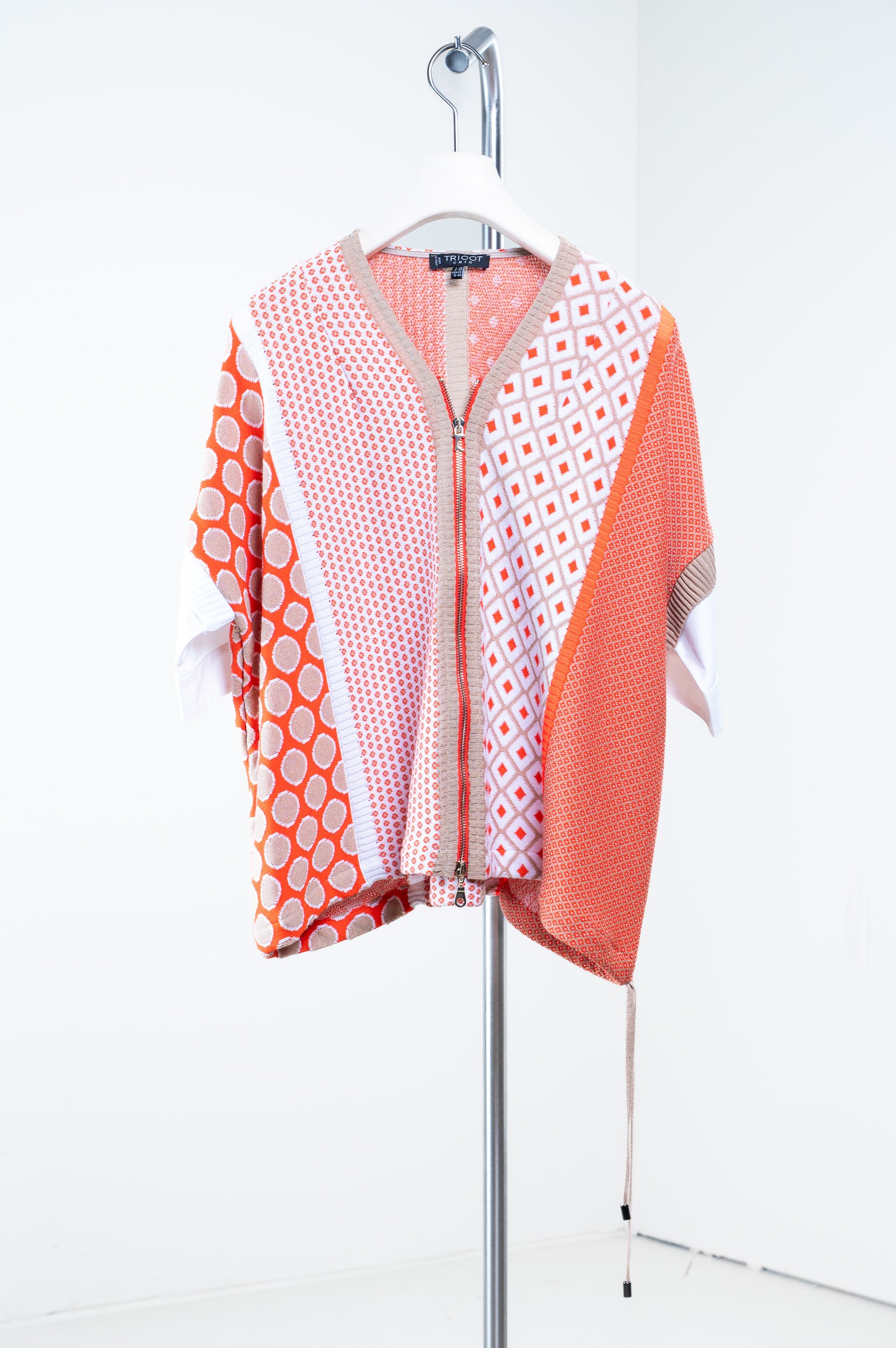 Front view of Tricot Chic Orange Block Pattern Zip-Up Sweater