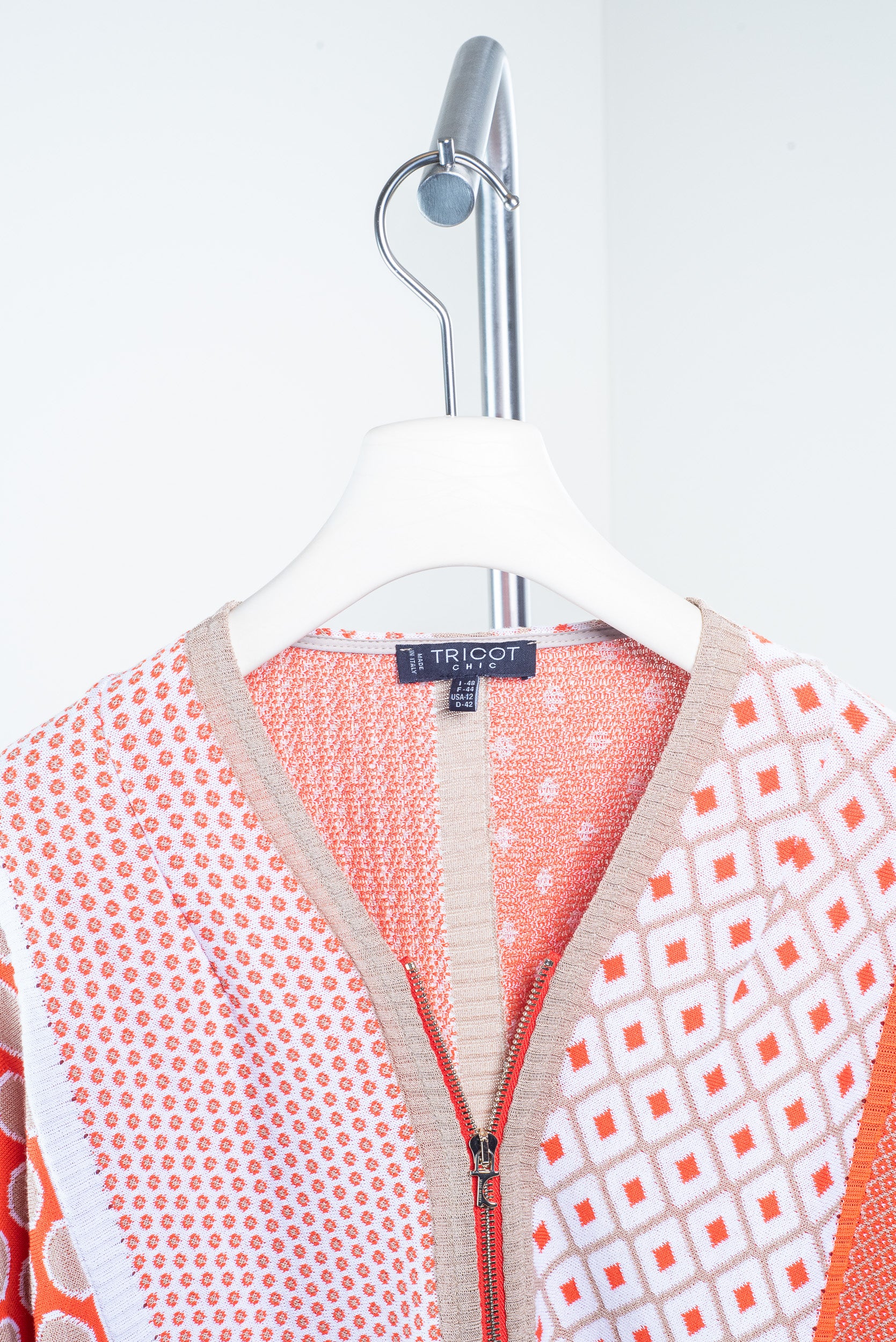 Close-up of neckline on Tricot Chic Zip-Up Sweater